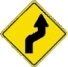 Right Double bend warning sign