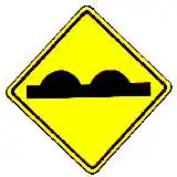 uneven road surface warning sign