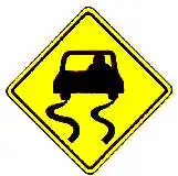 Thai slippery road warning sign